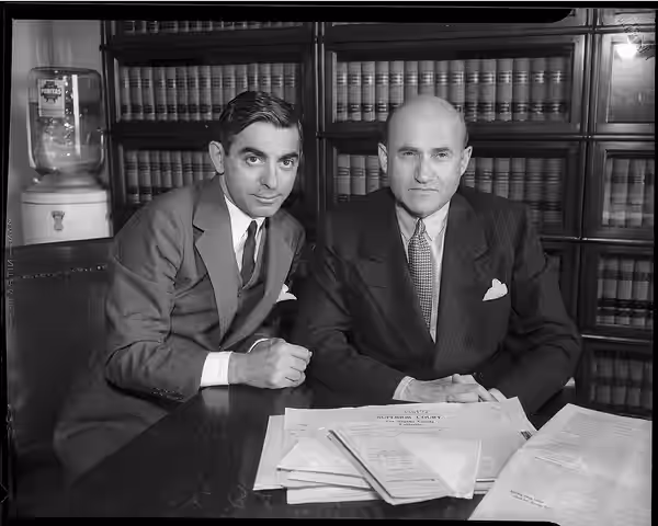 Actor and singer Eddie Cantor, left, and movie producer and mogul Samuel Goldwyn, right. The photo was likely taken in conjunction with a suit brought by Goldwy