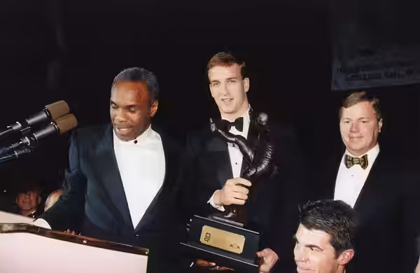 Peyton Manning (Tennessee) won the trophy in 1997. (2014)
