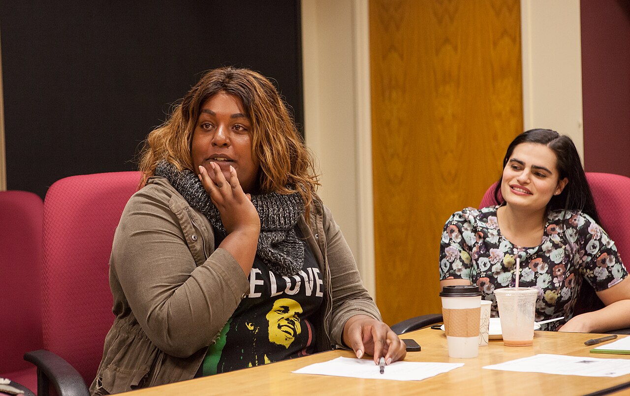 Aria Sa'id, sitting alongside Nava Mau, moderates a panel of trans women of color for the Kween Culture Initiative in San Francisco. (2018)