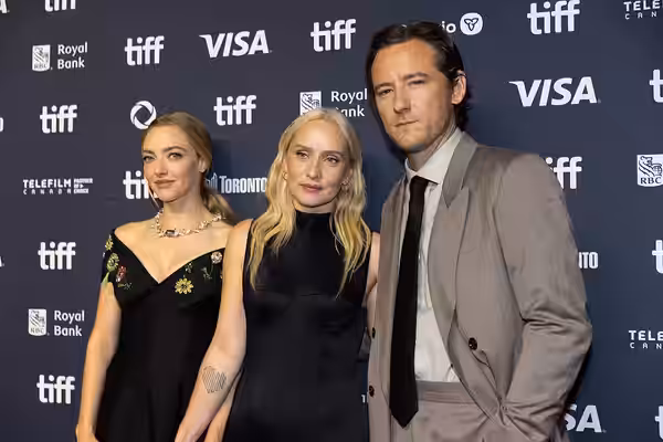 Amanda Seyfried, Mona Fastvold, and Lewis Pullman, actors and director, at the 2025 Toronto International Film Festival (TIFF) for the movie The Testament of An