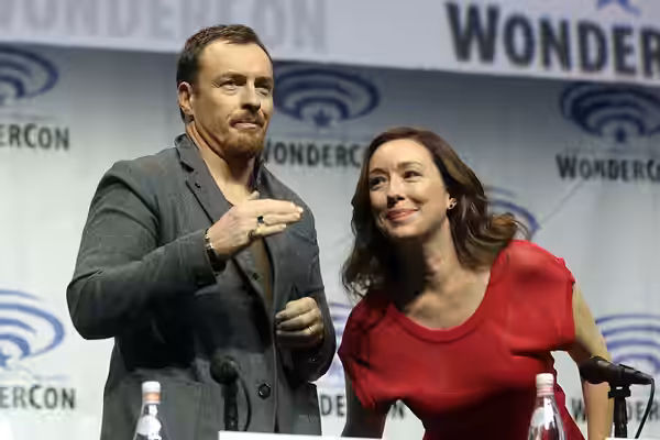 Toby Stephens and Molly Parker speaking at the 2018 WonderCon, for "Netflix's Lost in Space", at the Anaheim Convention Center in Anaheim, California. Please at