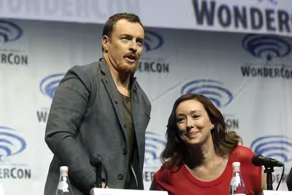 Toby Stephens and Molly Parker speaking at the 2018 WonderCon, for "Netflix's Lost in Space", at the Anaheim Convention Center in Anaheim, California. Please at