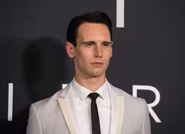American actor Cory Michael Smith arrives on the red carpet for the premiere of the film "First Man" at the Smithsonian National Air and Space Museum Thursday, 