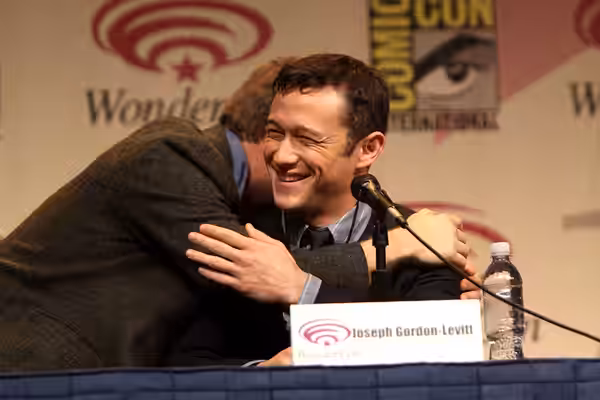 Joseph Gordon-Levitt and Rian Johnson speaking at the 2012 WonderCon in Anaheim, California. Please attribute to Gage Skidmore if used elsewhere.