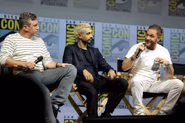 Ruben Fleischer, Riz Ahmed and Tom Hardy speaking at the 2018 San Diego Comic Con International, for "Venom", at the San Diego Convention Center in San Diego, C