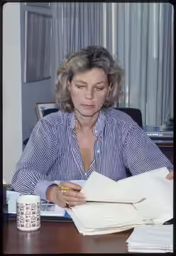 Lauren Bacall, actress (with manuscript for book "Lauren Bacall, By Myself" at Alfred A. Knopf office, NY)