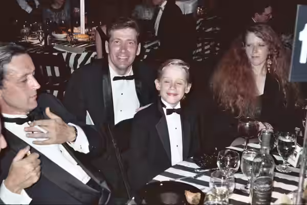 Ken Lillig with Macaulay Culkin and his parents Christopher "Kit" Culkin and Patrcia Brentrup at the Governor's Ball following the 1991 Emmy Awards. NOTE: Permi