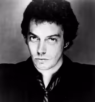 Tim Curry in a promotional picture of his 1978 LP debut Read My Lips