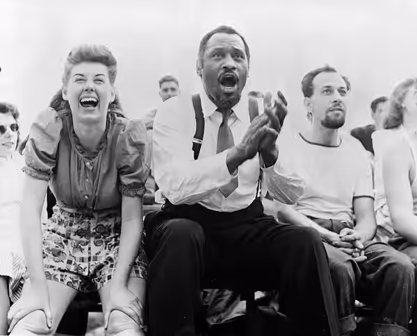 Title: [Paul Robeson and Jose Ferrer watching softball with other members of Othello production, Central Park, New York City] Date Created/Published: [1943 or 1 (2014)