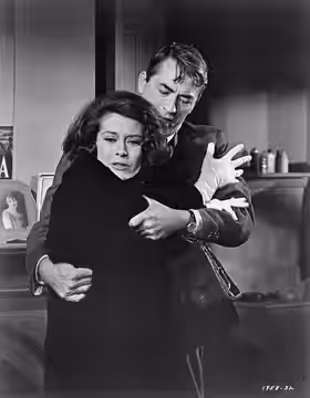 Publicity photo of Diane Baker &amp; Gregory Peck taken for film Mirage (1965). See also film still. No copyright notice.