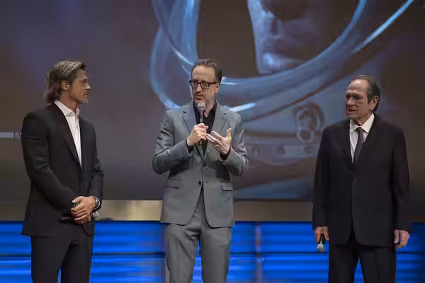 From left to right, actor Brad Pitt, producer, co-writer, and director James Gray, and actor Tommy Lee Jones are seen on stage before a screening of their film  (2019)