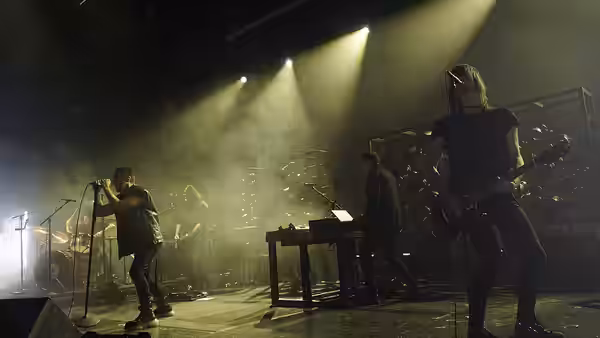 Nine Inch Nails performing at the O2 Apollo Manchester on June 20, 2022. From left to right: Ilan Rubin, Trent Reznor, Alessandro Cortini, Atticus Ross, Robin F