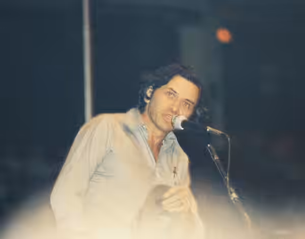 Promoter Bill Graham at a Cosby, Stills Nash &amp; Young concert, August 1974