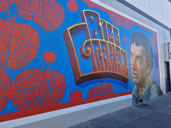 A mural of rock promoter Bill Graham near The Fillmore (2026)