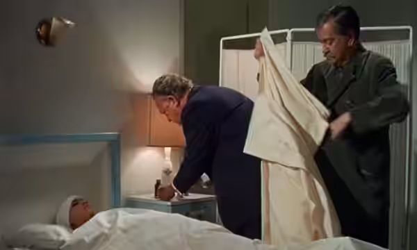 American actress Anna Thomson (in bed) and Mexican actors José Elías Moreno (black suit), and Carlos López Moctezuma (with white blanket) in the 1972 english tr (1969)