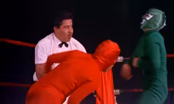 Mexican actress Norma Lazareno (red) and American actress Anna Thomson (green) in the 1972 english trailer for the film Night of the Bloody Apes (1969).