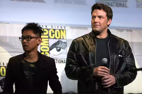 James Wan and Ben Affleck speaking at the 2016 San Diego Comic Con International, for "Warner Bros. Pictures", at the San Diego Convention Center in San Diego, 