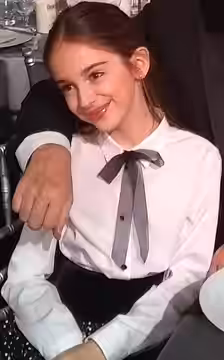 The “Once Upon a Time… in Hollywood” table with director Quentin Tarantino and young actress Julia Butters mugging for the camera during a commercial break in t (2020)
