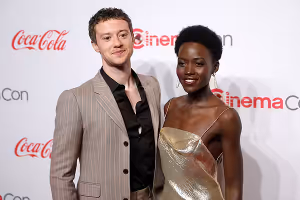 Joseph Quinn and Lupita Nyong'o on the red carpet at the Big Screen Achievement Awards at the 2024 CinemaCon at The Colosseum Theater at Caesars Palace in Las V