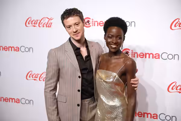 Joseph Quinn and Lupita Nyong'o on the red carpet at the Big Screen Achievement Awards at the 2024 CinemaCon at The Colosseum Theater at Caesars Palace in Las V