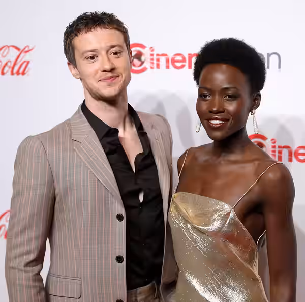 Joseph Quinn and Lupita Nyong'o on the red carpet at the Big Screen Achievement Awards at the 2024 CinemaCon at The Colosseum Theater at Caesars Palace in Las V
