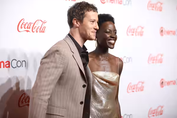 Joseph Quinn and Lupita Nyong'o on the red carpet at the Big Screen Achievement Awards at the 2024 CinemaCon at The Colosseum Theater at Caesars Palace in Las V