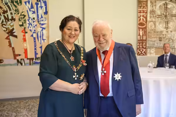 Sir Ian Mune (right), after his investiture as KNZM, for services to film, television and theatre, by the governor-general, Dame Cindy Kiro, at Government House (2024)