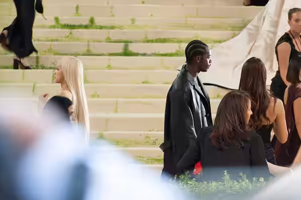 Damson Idris and a woman at the 2026 Met Gala, wearing fashion in theme of "Costume Art"