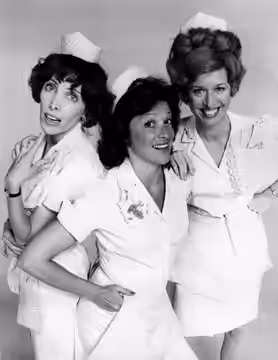 Cast photo of the waitresses at Mel's Diner from the television program Alice. From left: Beth Howland as Vera, Linda Lavin as Alice, and Polly Holliday as Flo. (1976)