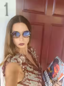 Lisa Marie Actress reading the book Unbound 05 doorway (2021)