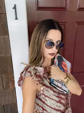 Lisa Marie Actress reading the book Unbound eyes looking (2021)