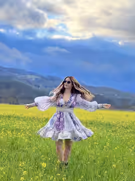 Lisa Marie in a mustard flower field (2023)