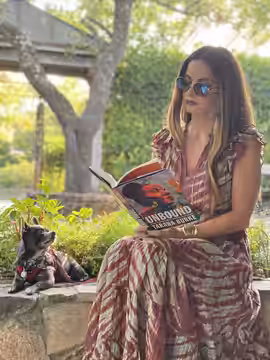 Lisa Marie Actress reading the book Unbound 04 chihuahua (2021)