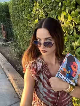 Lisa Marie Actress reading the book Unbound (2021)
