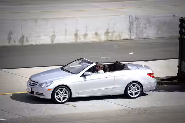 Zach Galifianakis driving the wrong way on the 73 freeway in a Mercedes-Benz E350 Convertible. This was during the filming of The Hangover 3. (2012)