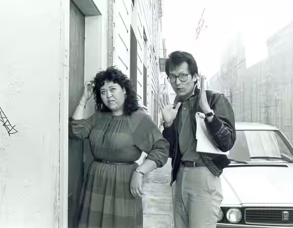 Actor Amy Hill and film director Wayne Wang on location in San Francisco's Nob Hill/Chinatown area. 1983 photograph by Nancy Wong.