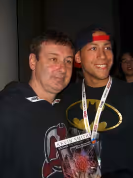 Artist, actor and reality television personality Walt Flanagan (left) poses with a fan follwoing the Comic Book Men panel discussion at the IGN Theater on Day 2 (2012)
