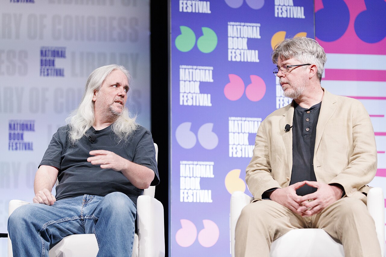 Ty Franck, left, and Daniel Abraham, the duo behind the pen name James S.A. Corey, speak with Cyndee Landrum at the 2024 Library of Congress National Book Festi