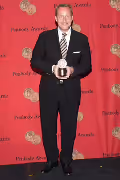 Adam Price with a Peabody Award for the television show "Borgen" (2014)