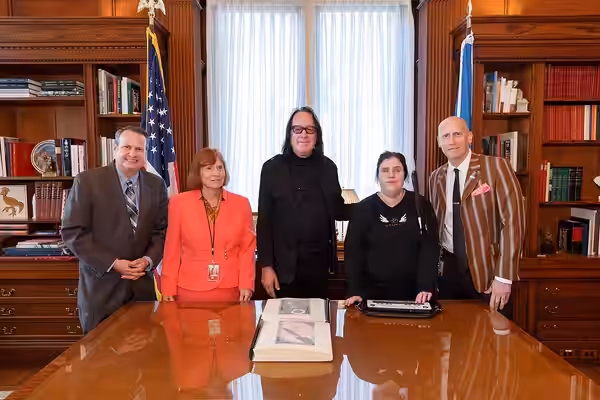 Singer and songwriter Todd Rundgren (center) donates to the Library a braille copy of his autobiography, "The Individualist," produced by fan Chelsea Dye (cente (2019)