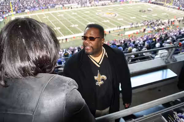 Actor Wendell Pierce with Baltimore Mayor Stephanie Rawlings Blake after a Saints loss to the Ravens in Baltimore, December 2010