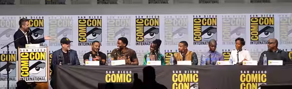 Chris Hardwick, Kevin Feige, Ryan Coogler, Chadwick Boseman, Lupita Nyong'o, Michael B. Jordan, Danai Gurira, Letitia Wright, Forest Whitaker speaking at a Blac (2017)