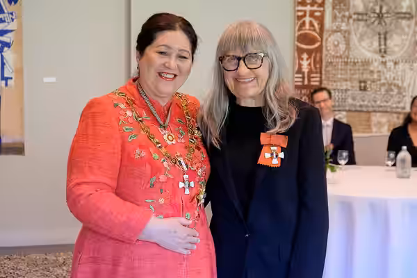 Robin Scholes (right), after her investiture as CNZM, for services to the screen industry, by the governor-general, Dame Cindy Kiro, at Government House, Auckla (2025)