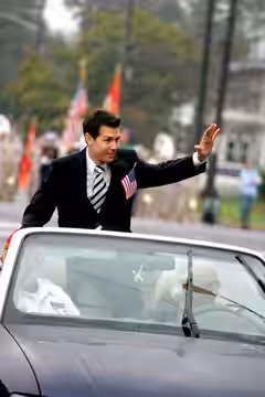 Actor Jon Seda waves from the motorcade leading the John Basilone Parade in Raritan, N.J. Seda will play John Basilone, a native Marine Medal of Honor and Navy  (2009)