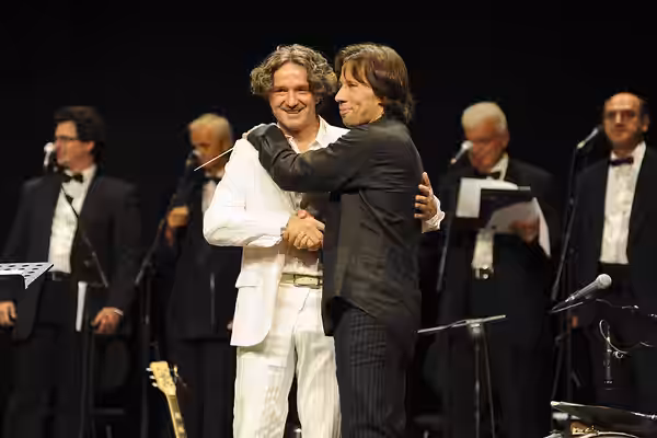 Goran Bregovic (left) and Kristjan Järvi (right), and Wedding and Funeral Band with Kristjan Järvi's Absolute Ensemble in teatro Manzoni, Milan (2008)