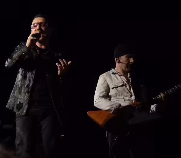 An image of Bono and The Edge of U2, taken at a U2 360 concert in Toronto at the Rogers Centre (2009)