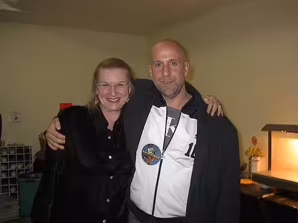 American poet Hedwig Gorski with Swedish actor Peter Stormare meet backstage at Bob Dylan's concert in Prague, Czech Republik, Oct. 2003.