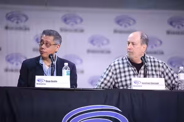 Dean Devlin and Jonathan Glassner speaking at the 2023 WonderCon, for "The Ark", at the Anaheim Convention Center in Anaheim, California. Please attribute to Ga