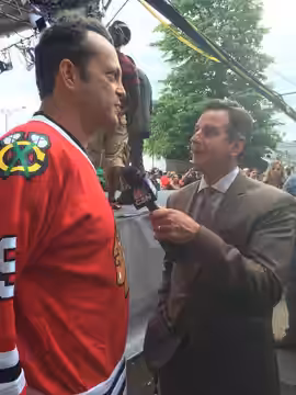 Chris Boden interviews actor Vince Vaughn prior to a 2015 Chicago Blackhawks Stanley Cup game.