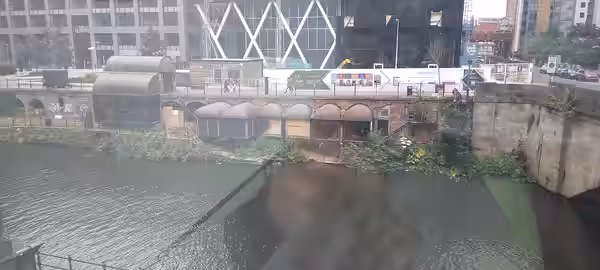 The remains of the Mark Addy pub, on the River Irswell, Manchester. or technically Salford. As viewed from the window of the People's History Museum. The bar wa (2023)